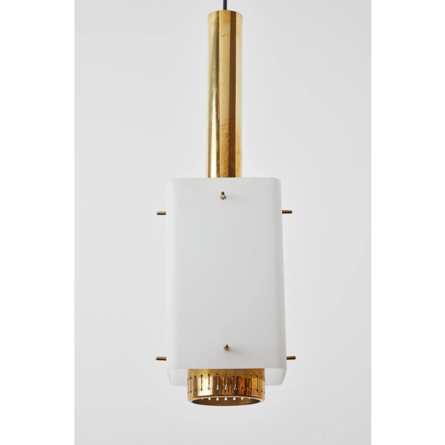 Large 1950s Stilnovo brass and glass pendant. A quintessentially 1950s Italian design executed in matte finish opaline...