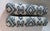 A matching pair of cotton blue and white Ikat bolster pillows with no visible marks or stains in good condition used with...