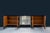 Large sideboard on legs with wavy profile made of walnut root and birch root wood. Wavy front with six doors that hide 3...