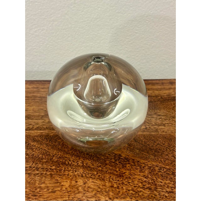 Sculptural 1960s Scandinavian Modern blown glass bud vase with a wonderfully unusual optical form. The heavy clear glass...