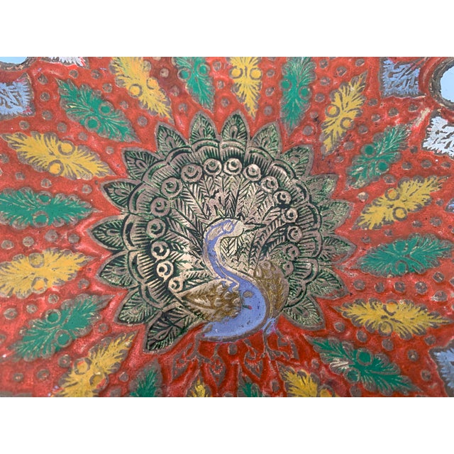 Brass plate engraved with a peacock and painted by hand, 1960s , artisan production. A few decades ago from India or the...