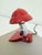Vintage circa 1950s mini metal clip lamp that features a mushroom-shaped shade, vibrant red paint on an aluminum frame...