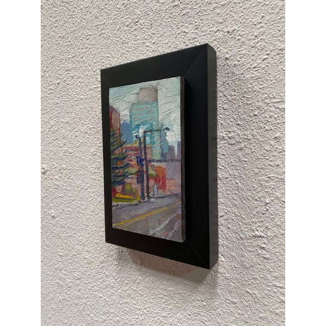 Snowy City Atmosphere by Delton Demarest | Oil on panel Cityscape with snow and buildings. For Sale - Image 4 of 5
