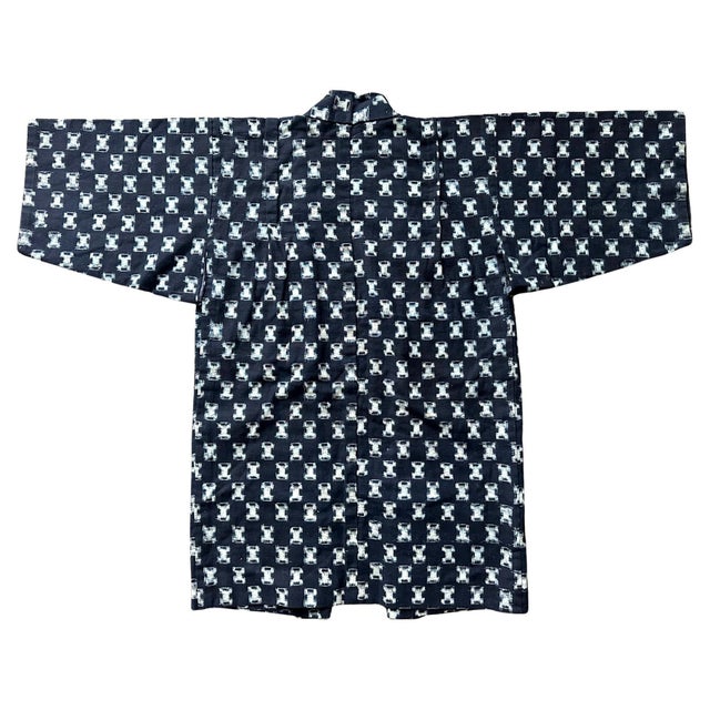 A rare and well preserved Japanese woven child's kimono circa early 20th century (end of Meiji period). The small kimono...