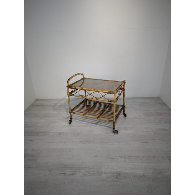 A mobile bar from the 1960s/1970s, designed in a timeless Scandinavian style with a touch of boho and mid-century modern...