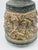 This outstanding artist studio pottery vase is masterfully crafted. The center is highly textured with figures and is...