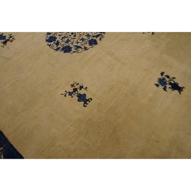 Antique Peking Chinese Allover Floral Blue Navy, Ivory Beige Cream White 1920s Rug, Circa Date: 1920s. This exquisite...