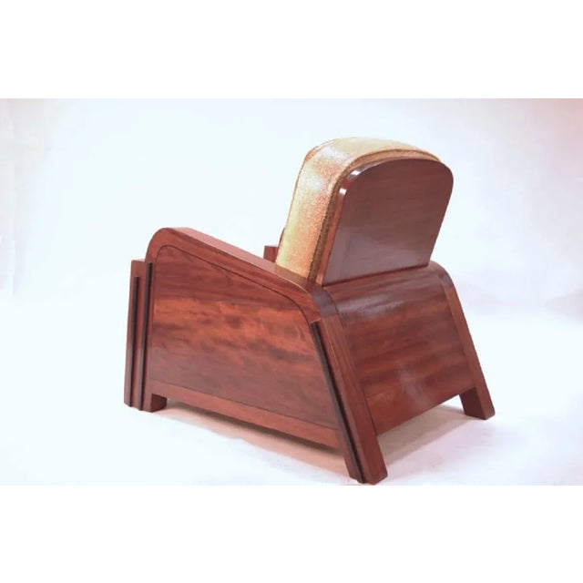 Pair of Art Deco armchairs in exotic wood with butterfly marquetry patterns in front. Fabric in gilt galuchat imitation....