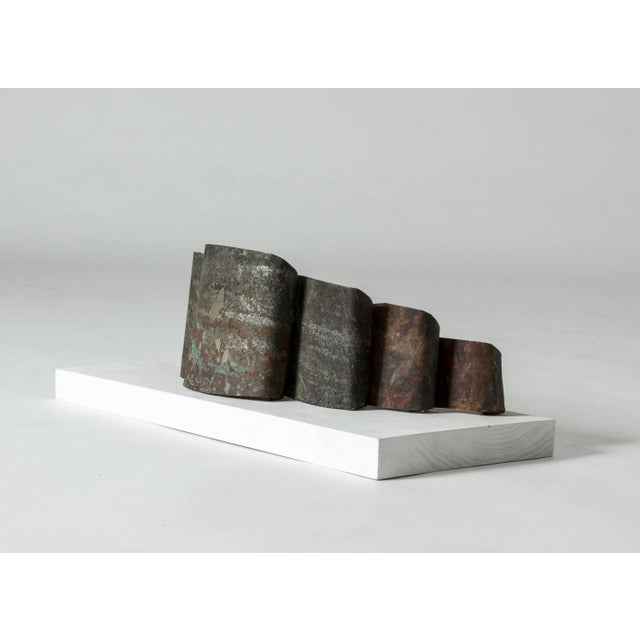 Striking metal sculpture by Fred Leyman. Iron sheets are flanged into arched shapes and their design and patinated surface...