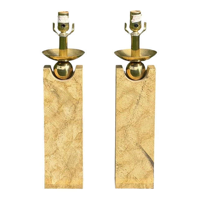 Striking pair of vintage modernist table lamps featuring tall, rectangular columns with a richly textured, hand-finished...