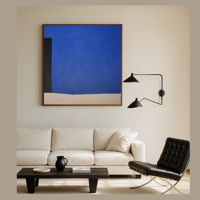 A bold dialogue between calm and contrast. This original square painting features an intense cobalt blue, softened by...
