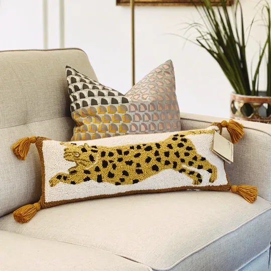 A beautiful bohemian style wool hooked throw pillow by Justina Blakeney. This lumbar pillow will look gorgeous resting on...
