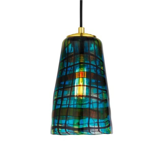 Hand-blown by master glassmakers in Venice, Italy, the Tartan Pendant Light by Oggetti showcases the time-honored artistry...