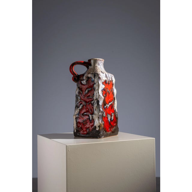 Bring bold mid-century modern design into your home with this striking West German “Fat Lava” vase, crafted by Ü-Keramik...