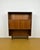 Vintage 1950s Danish teak bookcase with sliding doors and open shelves, a functional design perfect for mid-century decor....