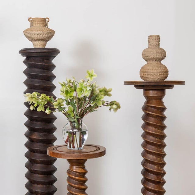 Tall twisted wood pedestal table from France, 1940s. Made of solid wood with original finish. Great carved twisted wood...