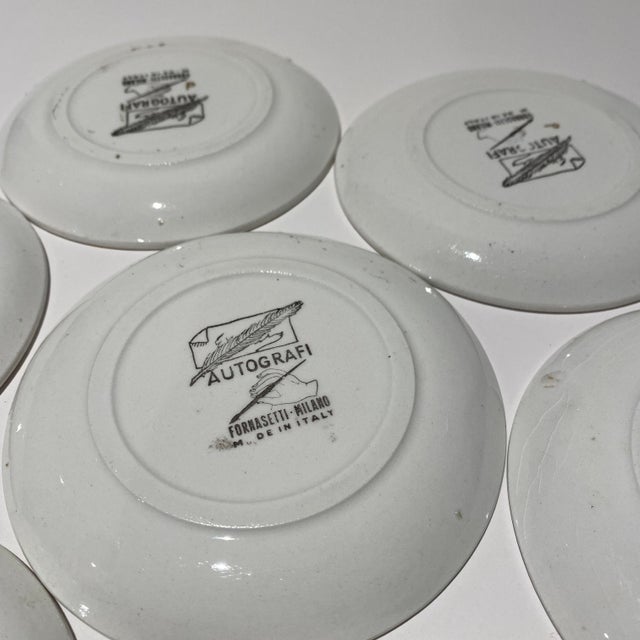 Set of Seven Vintage Italian Gilt Porcelain “Autografi” Coasters by Piero Fornasetti For Sale - Image 11 of 12