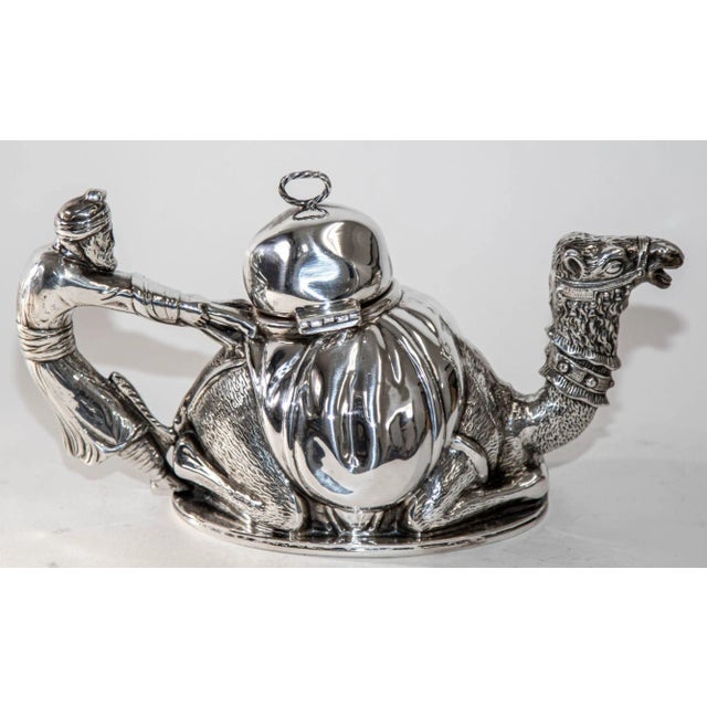 An exceptional French silver-plated “Karawan” camel-form teapot by Mariage Frères, Paris, dating to the early 1990s. This...