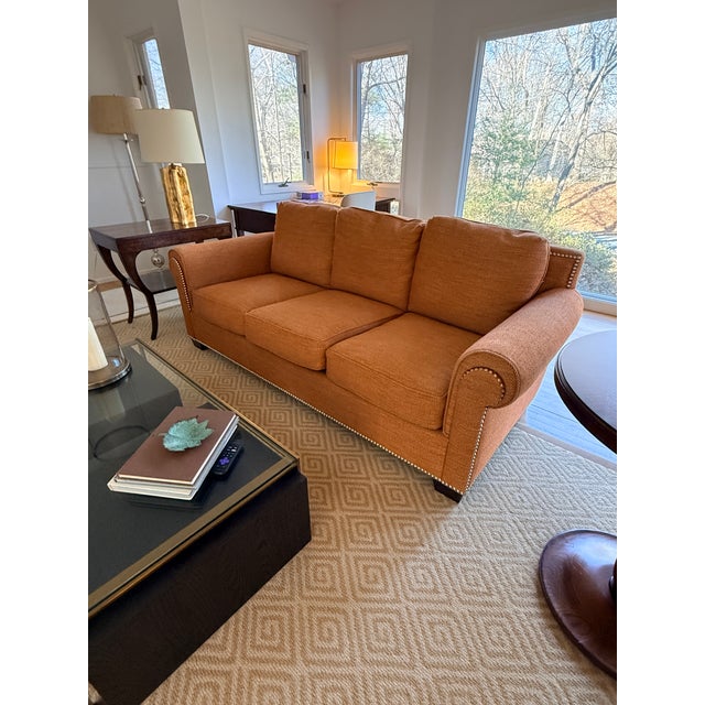 Stewart Furniture Orange Sofa This is our color! A traditional three seat sofa with roll arms and nailhead trim in a the...