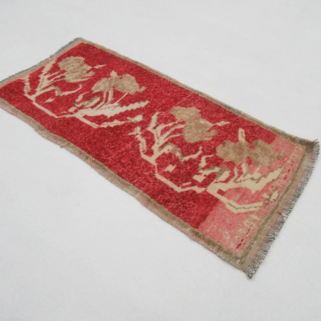 Vintage handknotted decorative mini rug from Konya region of Turkey. Approximately 50-60 years old. In very good condition.