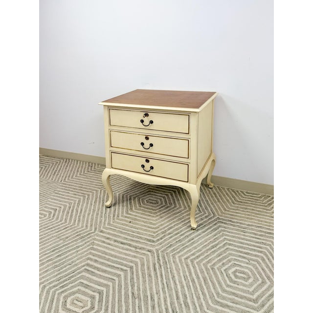This charming vintage Provincial chest of drawers is a characterful and well-made antique storage find. The three generous...
