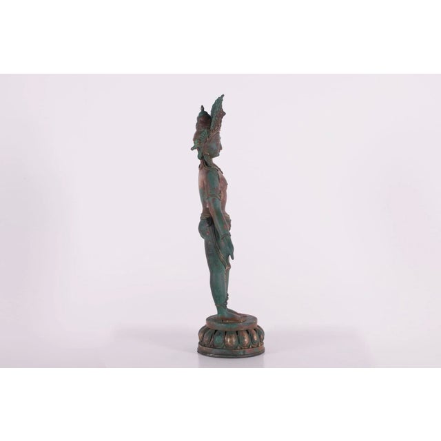Indra, lord of storms and king of the kingdom of the Gods, bronze (copper alloy), Nepal, 20th century. H 47 cm x W 15 cm x...