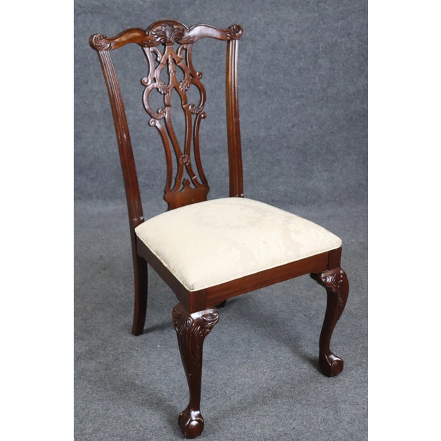 This is a gorgeous set of 8 solid mahogany Maitland Smith attributed Chippendale dining chairs in good original vintage...