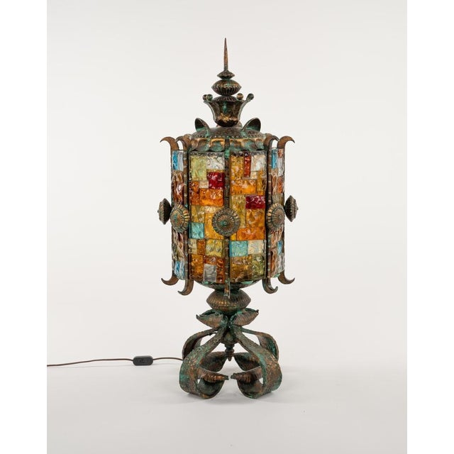 Midcentury amazing floor lamp or table lamp in golden wrought iron and multi-color hammered glass produced by longobard...