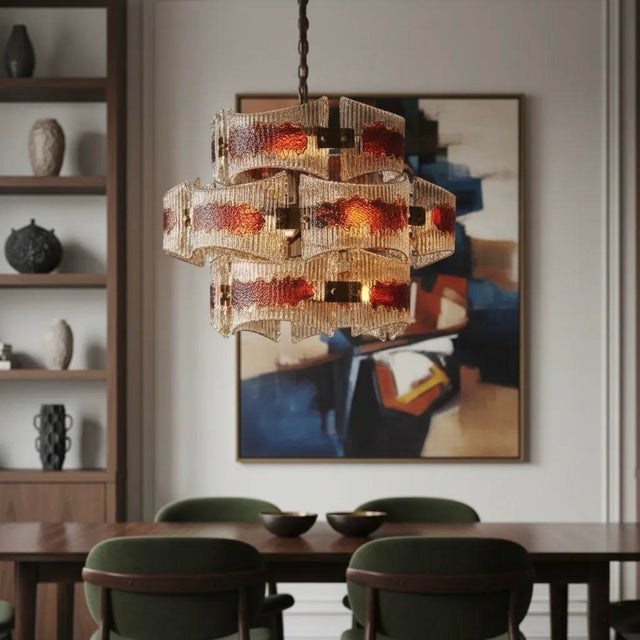 An extraordinary Italian chandelier from the 1970s, likely created for a sophisticated coastal interior where warm amber...