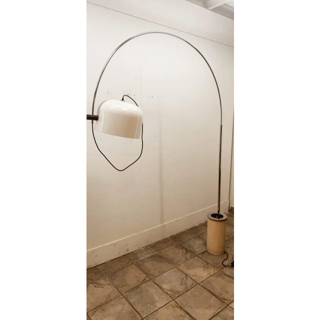 Arch Floor Lamp with Ashtray by Luigi Massoni for Guzzini, in Very Good conditions. Designed 1970 to 1979 This piece is...