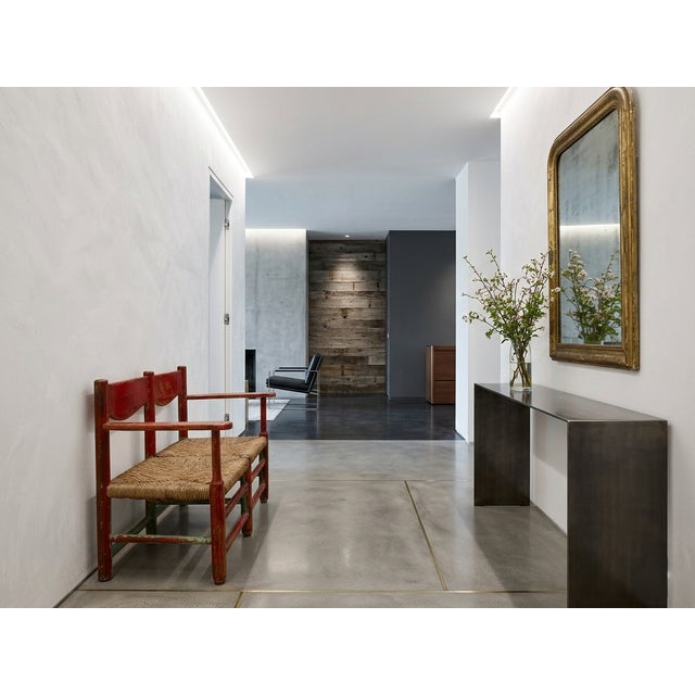 This exceptional early 20th-century bench is a masterclass in rustic elegance, offering a rare blend of folk-art charm and...