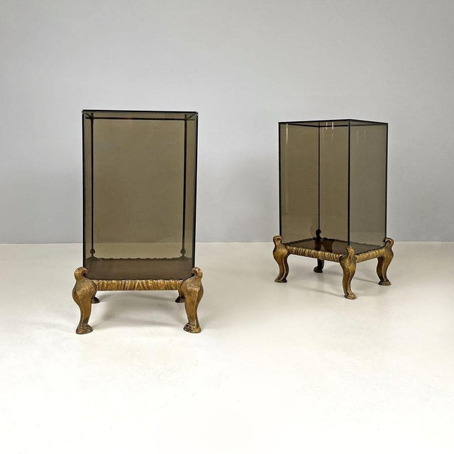 Italian modern golden wood and grey glass coffee tables or pedestals, 1970s Pair of square-based coffee tables. The wooden...