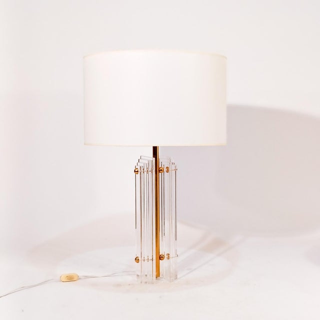 Large table or table lamp by Charles Hollis Jones, USA, 1970s. Sculptural body in the shape of a skyscraper formed by two...