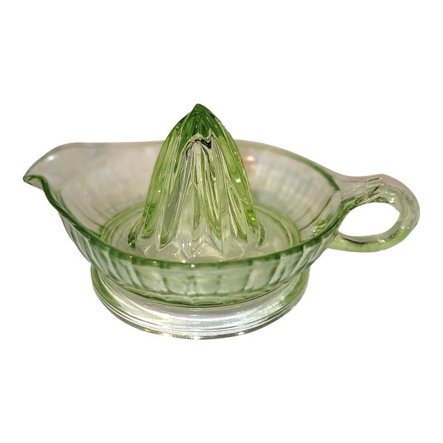 Vaseline glass citrus squeezer from Anchor Hocking c 1940s. Excellent condition and excellent glow under UV light