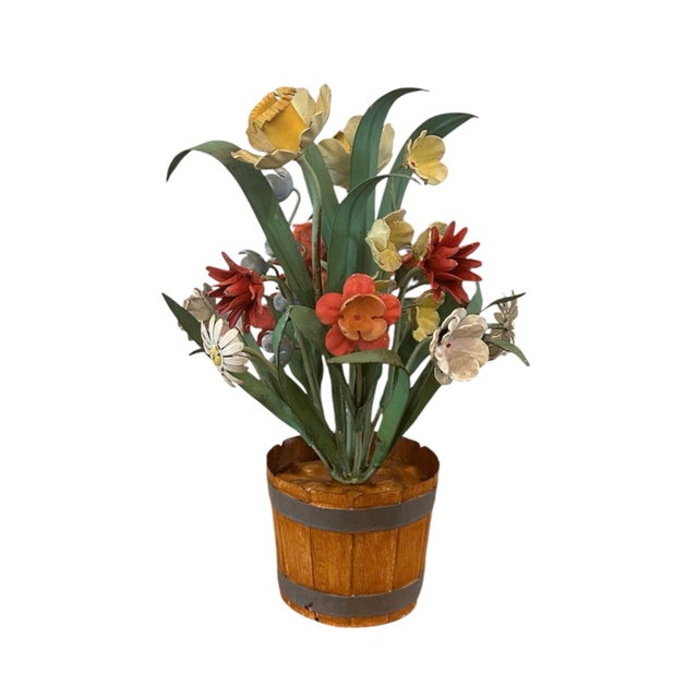 A lovely, vintage tole floral arrangement. Features a bouquet of blooms including daffodils and bluebells surrounded by...