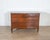 An elegant Venetian Directoire chest of drawers dating to circa 1780, crafted in solid walnut of exceptional quality. The...
