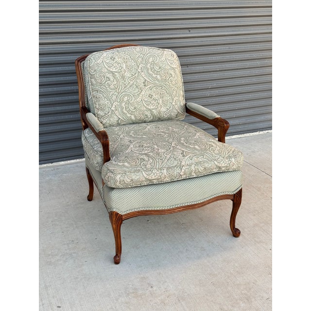 Vintage Hickory White French Provincial-style fauteuil or bergère armchair with exposed wood frame and sage green brocade...