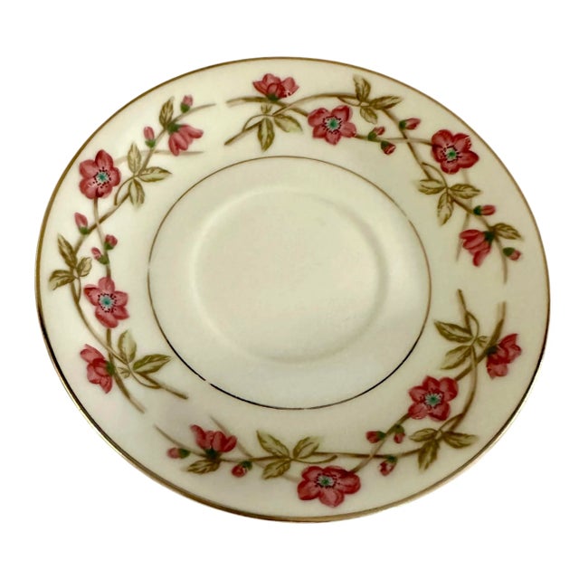 A set of 5 Porcelain saucers in "Briar Rose" pattern by Valmont China. This pattern features delicate pink wild roses with...