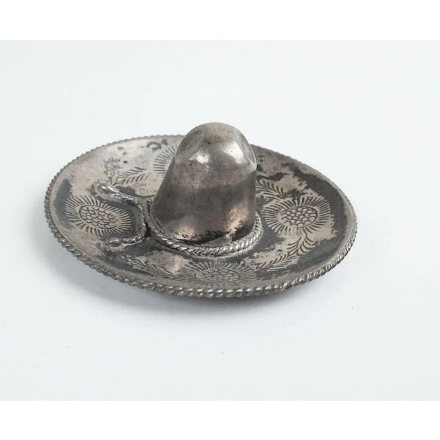 Vintage mid 20th century sterling silver small sombrero. Marked Mexico .925 Platerio Alejo, stamped floral design with...