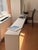 Harris Rubin 90”. metal table. Painted cream