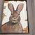 Approximately 5.5 x 7.5 painting on Masonite signed bottom right Overall size with distressed wood frame is 9 x 11