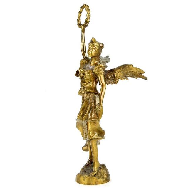 Large brass statue of the Goddess of Victory The presented sculpture depicts the Goddess of Victory, known as Nike in...