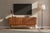 This striking mid-century modern credenza showcases the clean lines and sculptural elegance that define classic 1960s...