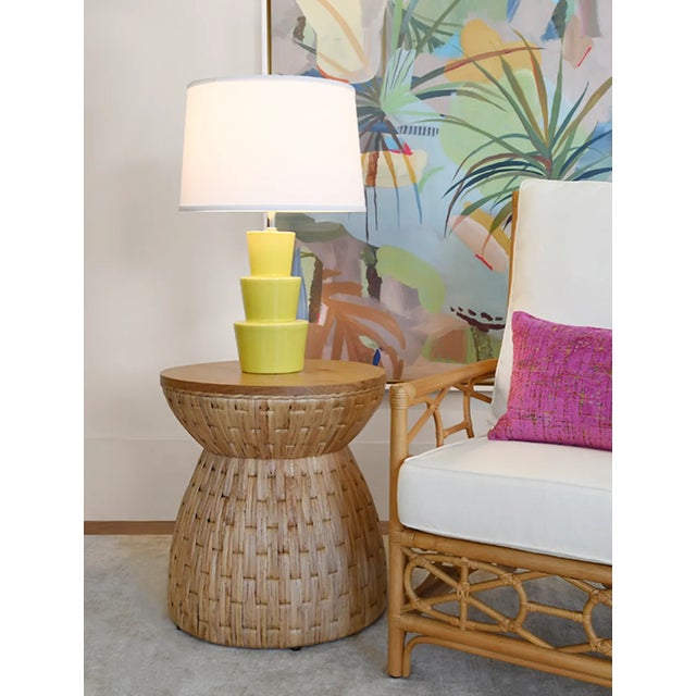 The Fiji round occasional table is woven from water hyacinth then topped with a beautiful Mindi wood top. It's the perfect...