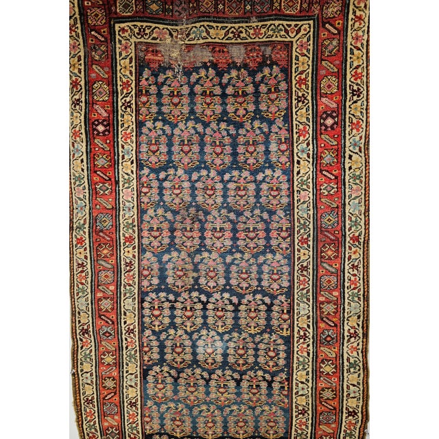 A rare 19th century handwoven Persian Bidjar runner of exceptional beauty and historical significance, this piece carries...
