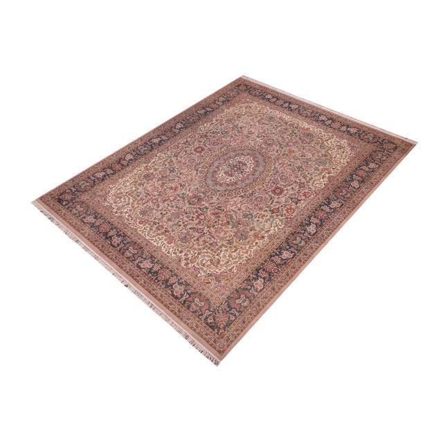 Designed with mesmerizing intricacy and gorgeous color palette, this hand-knotted masterpiece demonstrates the beauty and...