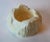 A vintage cream tone marble ashtray.