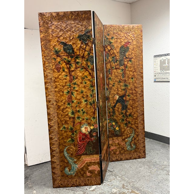 Design Plus Gallery presents a Hand Painted with Decorative Chinoiserie Room Divider. The folding screen has a gilt toned...