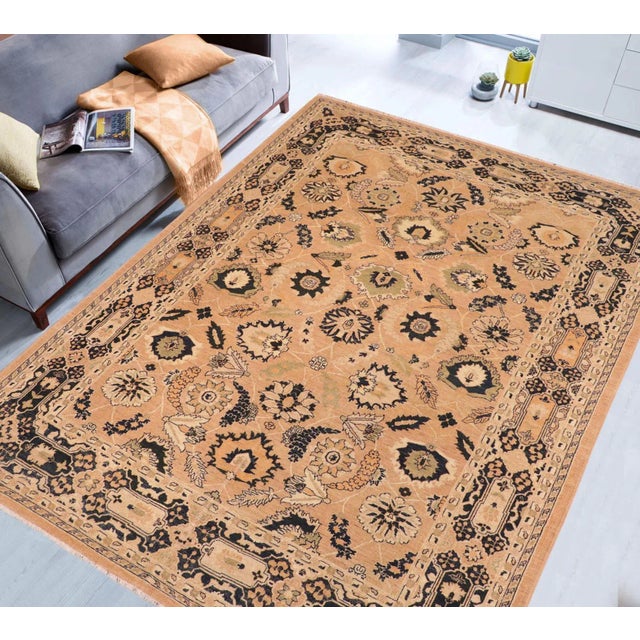 "Enhance the ambiance of your home with this magnificent Persian-influenced Turkish hand-knotted rug made by skilled...