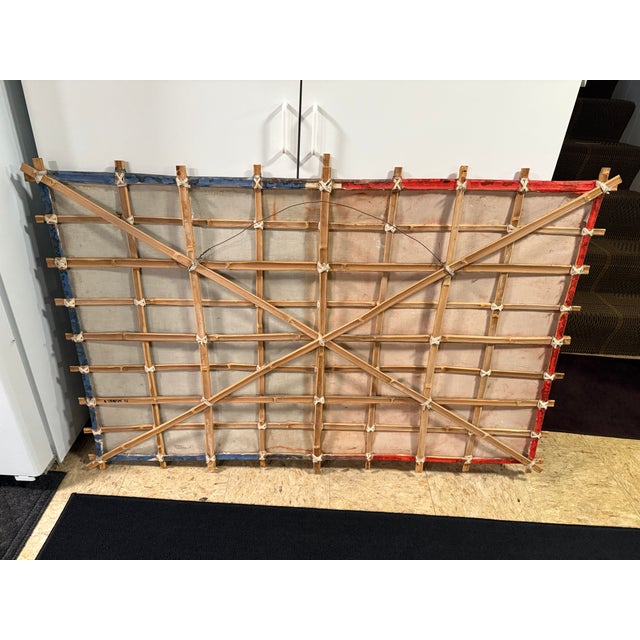 Original paper kite on canvas with bamboo structure. Titled "Characters (Growing)" by Michael Thompson. Red, blue, and...